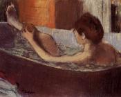 Woman in a Bath Sponging Her Leg
